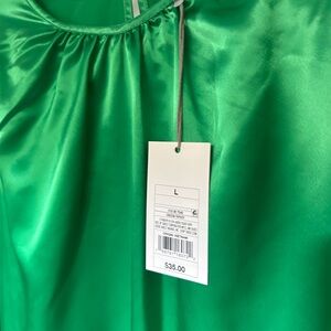 Emerald green target satin dress. NWT. Size L. Thick satin fabric with pockets.
